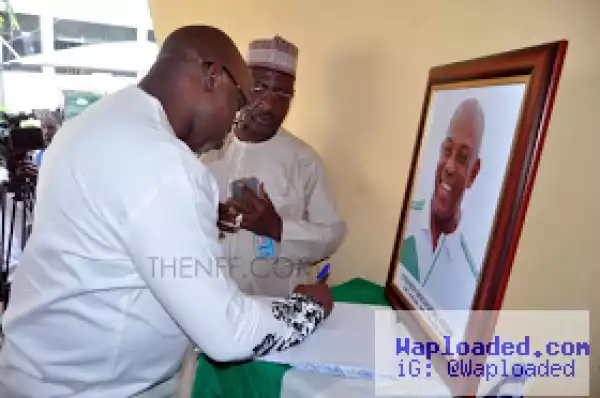 Photo: NFF President Amaju Pinnick signs condolence register opened in honour of late Stephen Keshi